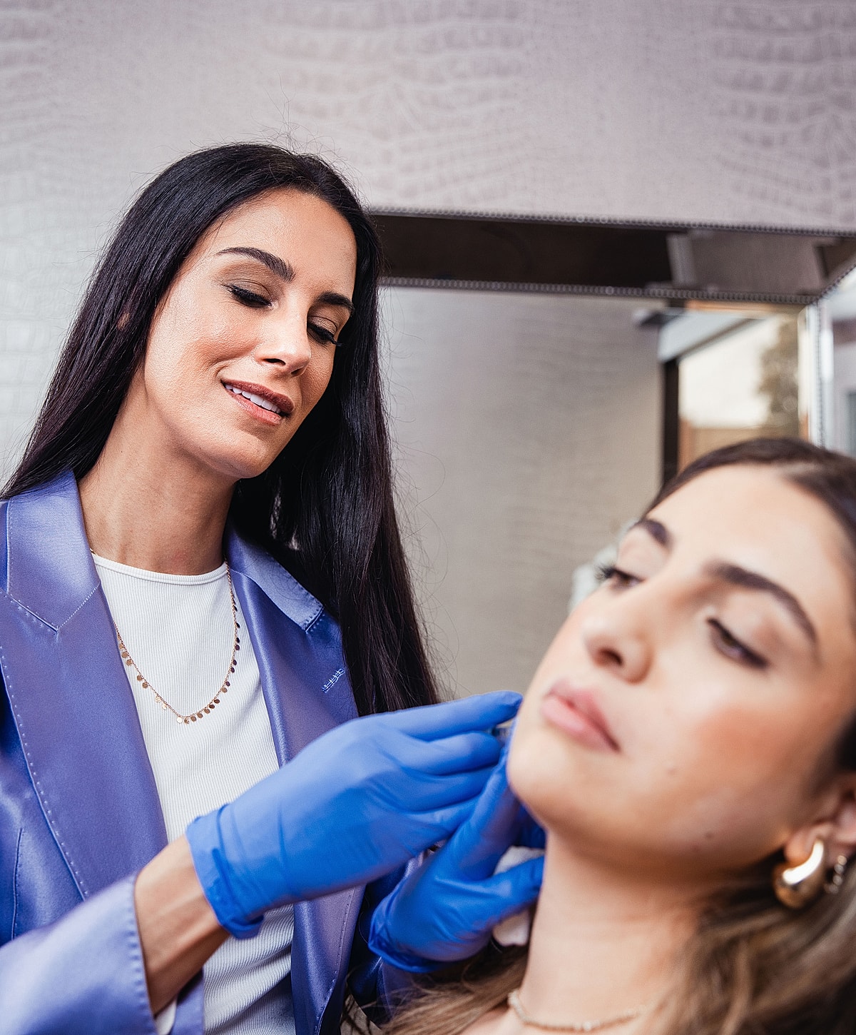 Woman in black leggings outdoors, focused on legs.