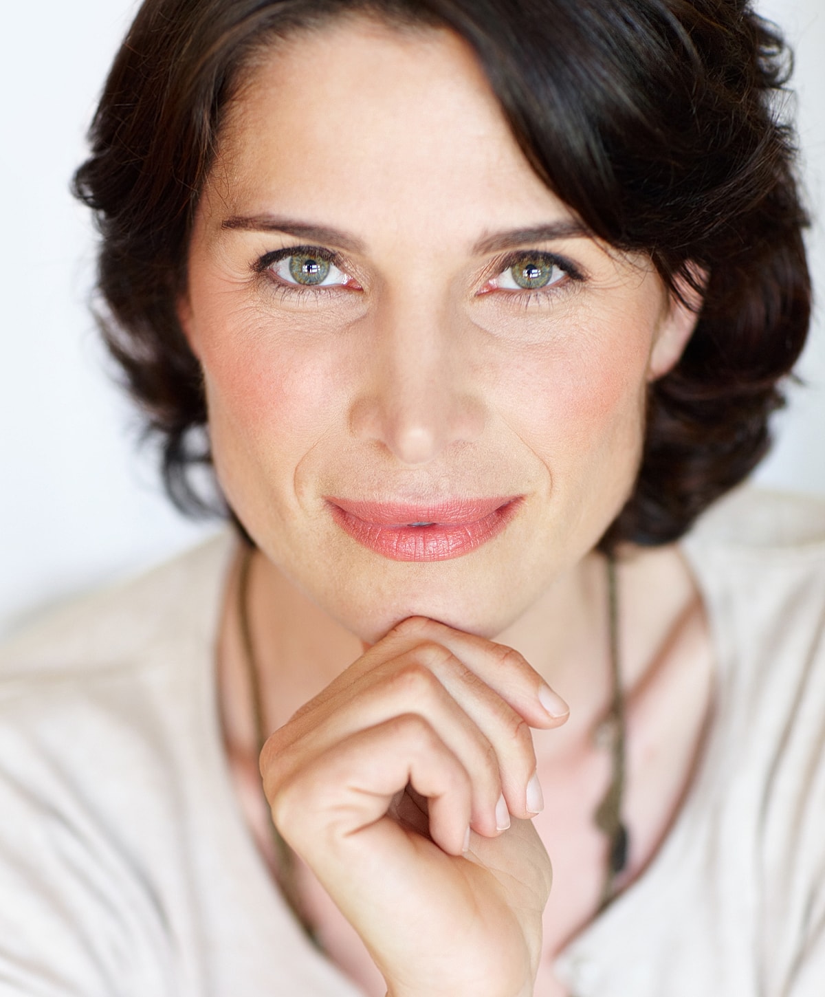Woman walking up stairs in fitted jeans.