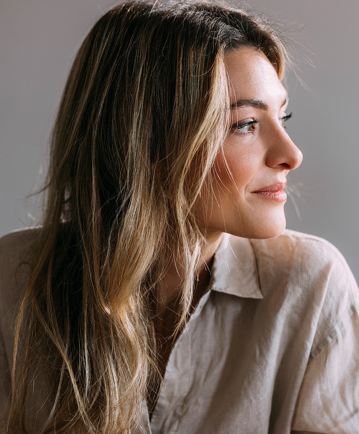 Woman in black leggings outdoors, focused on legs.