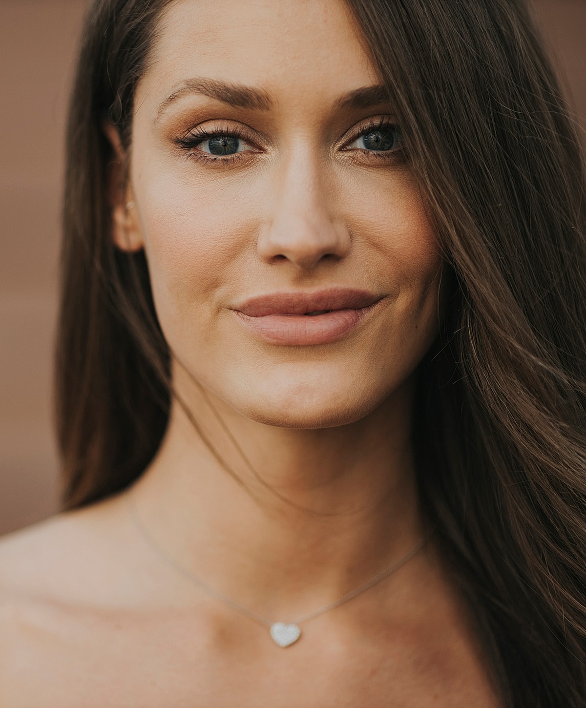 Woman in black leggings outdoors, focused on legs.