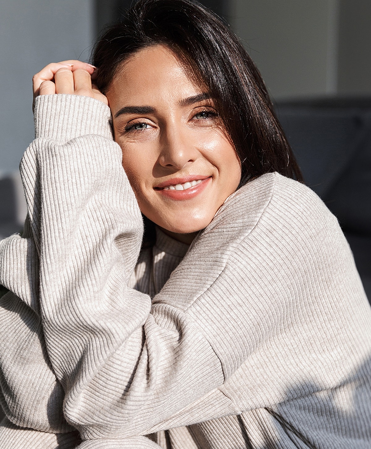 Woman in black leggings outdoors, focused on legs.