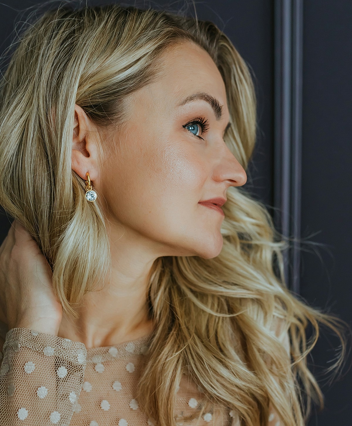 Woman in black leggings outdoors, focused on legs.