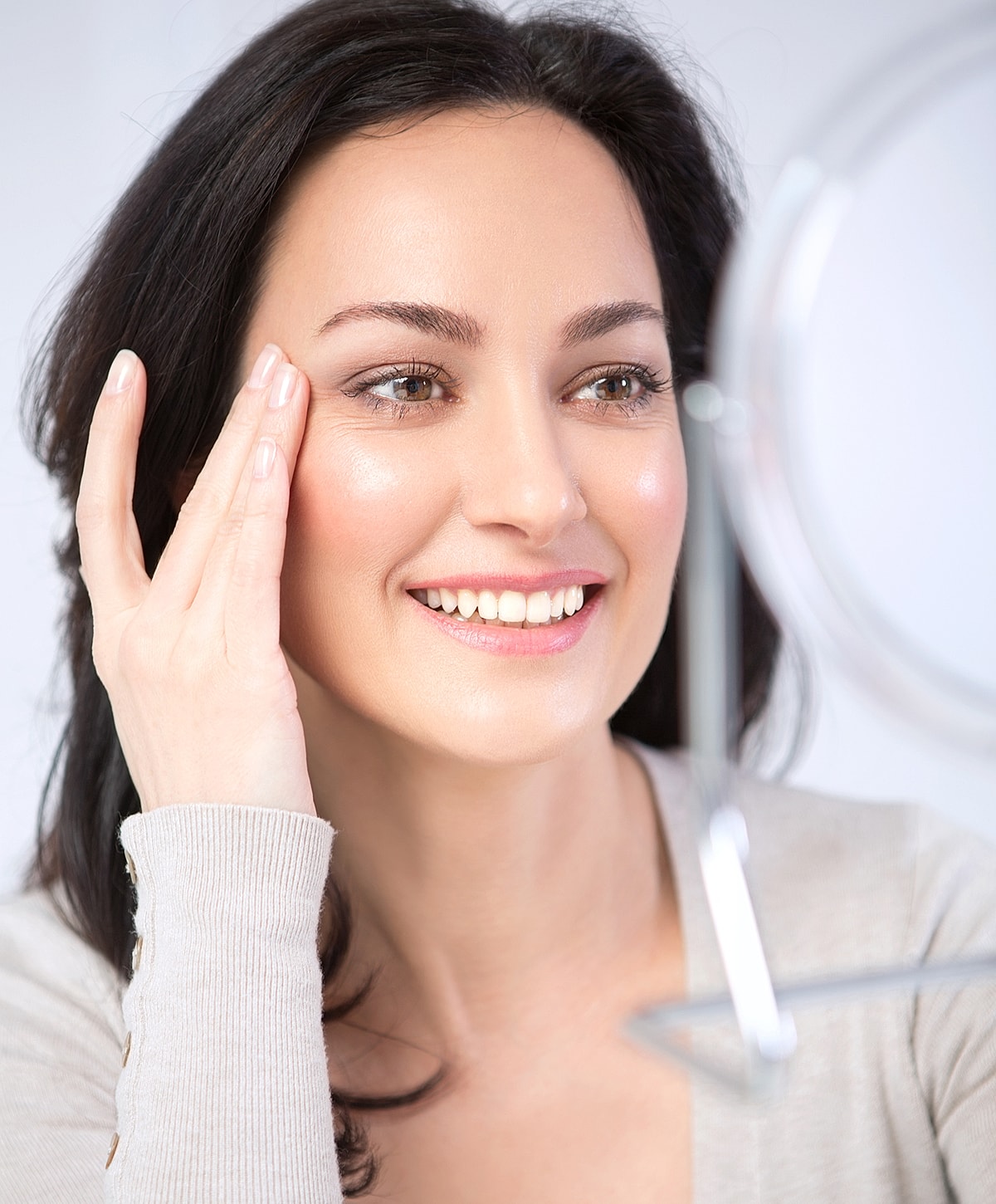 Woman in black leggings outdoors, focused on legs.
