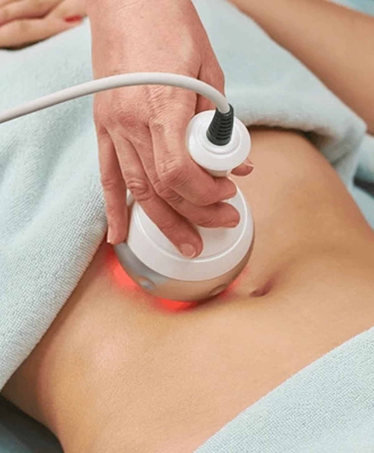 Woman in black leggings outdoors, focused on legs.