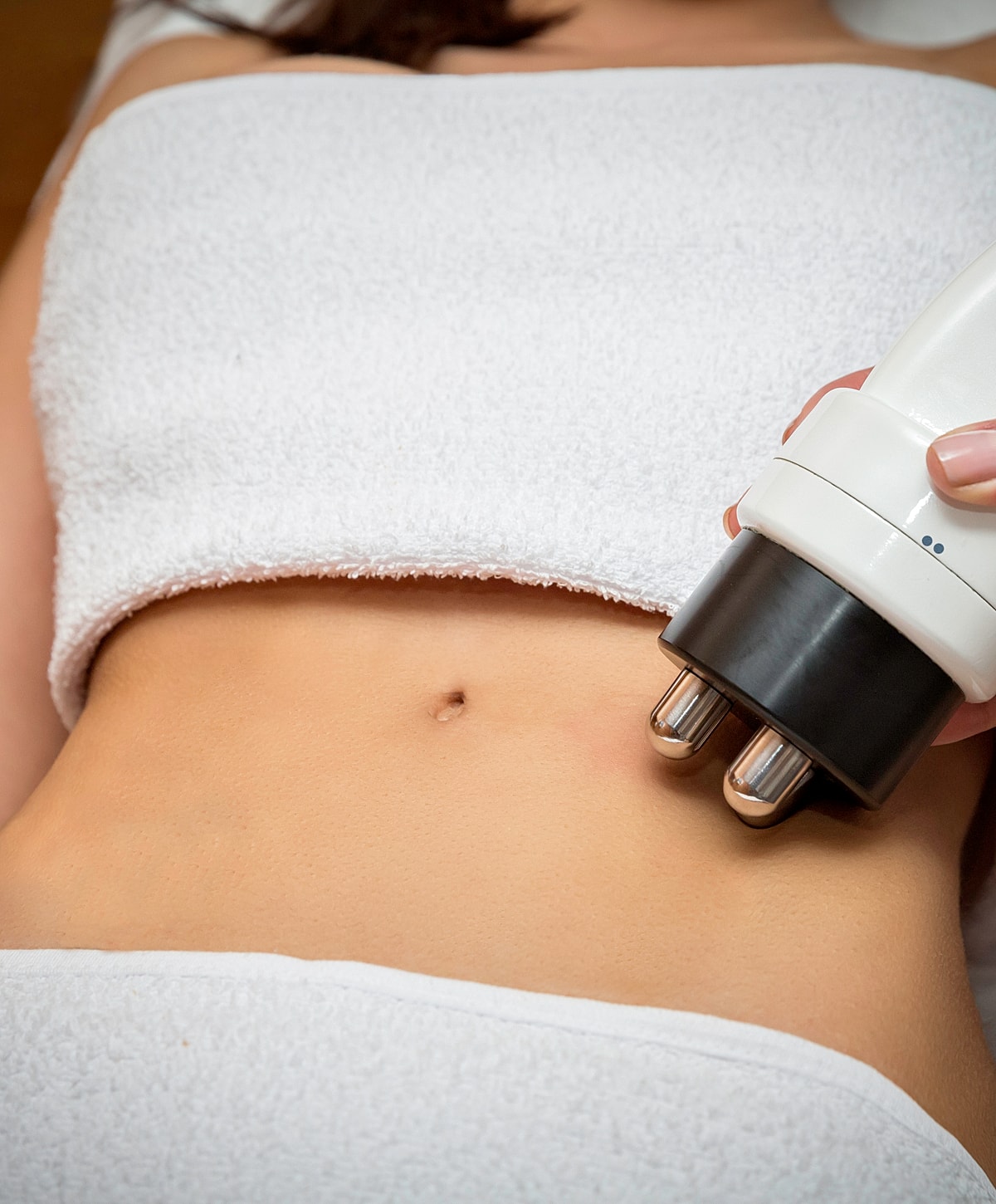 Woman walking up stairs in fitted jeans.
